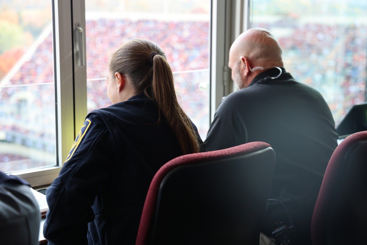 Captain Cline and Lieutenant Palmer observing Lane Stadium during a home football game.