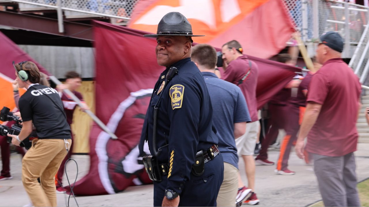 Vince Houston waiting on the Virginia Tech football team to run onto the field. 