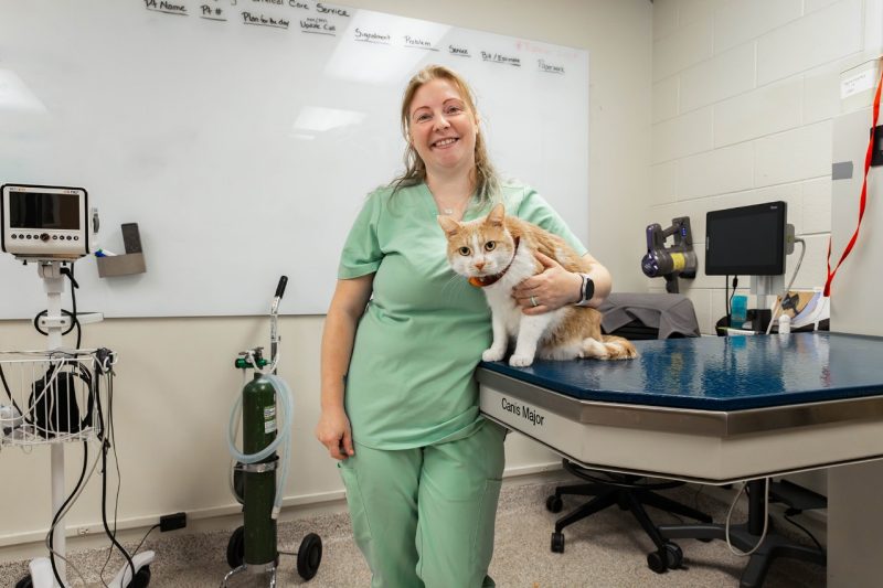 Emergency Veterinary Technician Tiffany Luci and her cat Marigold.