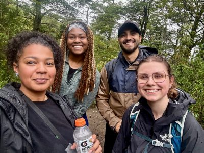 (From left) Ana Ryan and Allison Bishop with Chilean students on a hike.