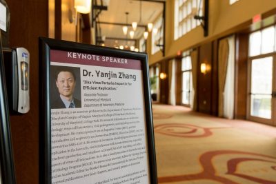 Poster on Dr. Yanjin Zhang who was a keynote speaker at the veterinary college’s annual research symposium.