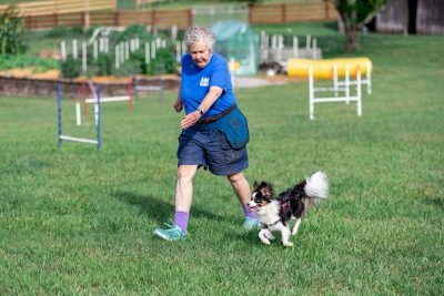 Sharon Harrell (at left) with her dog, Miryam during agility training.