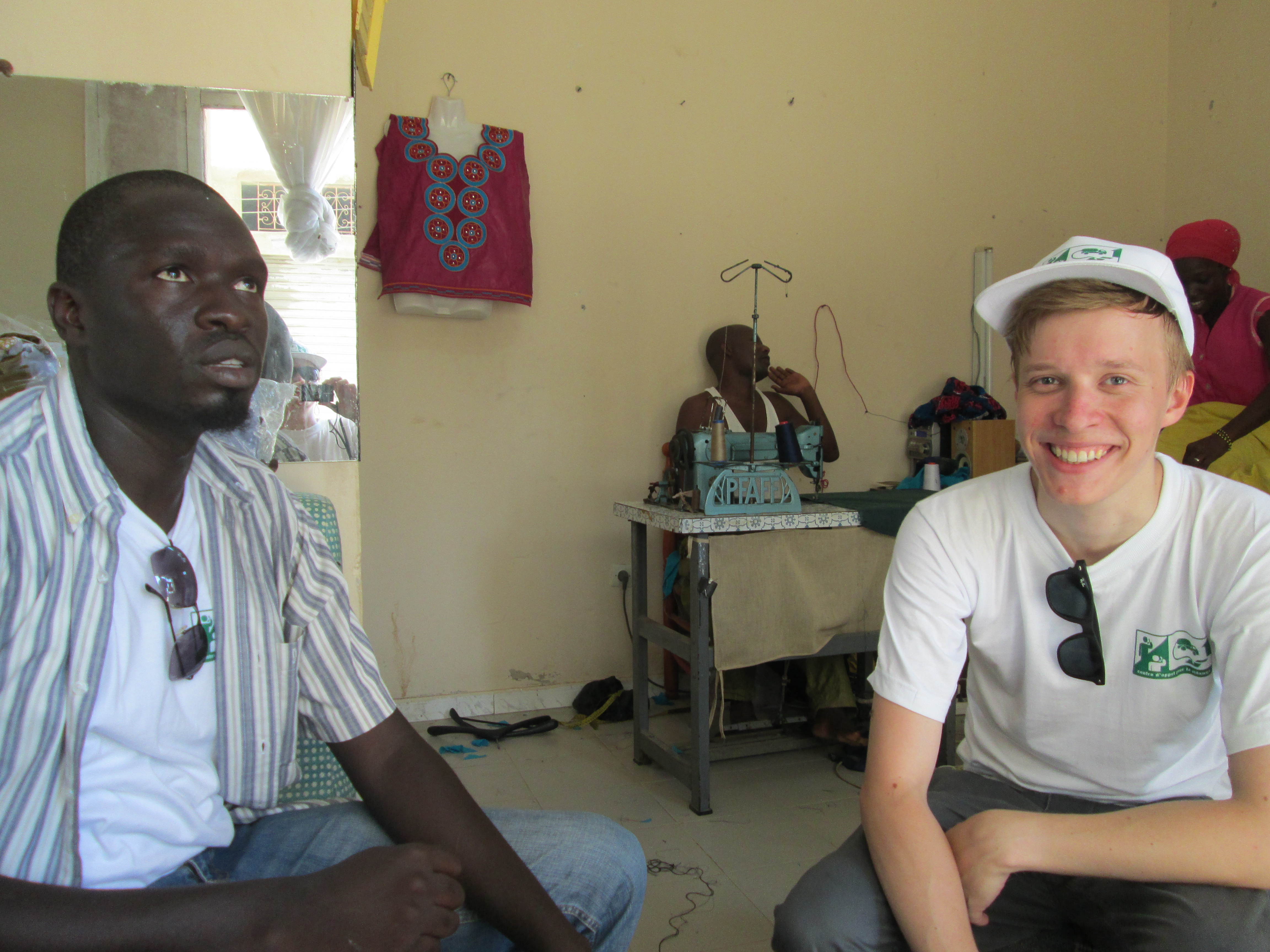 Joshua Deutschman with residents of a Dakar, Senegal neighborhood