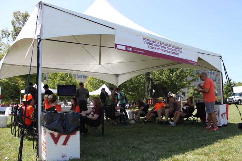 People at a tailgate party