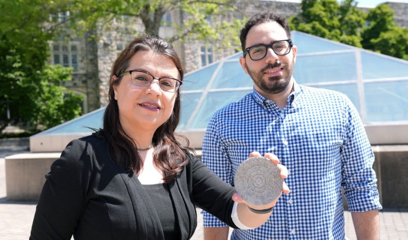Shima Shahab and Ahmed Sallam with an acoustic hologram plate.