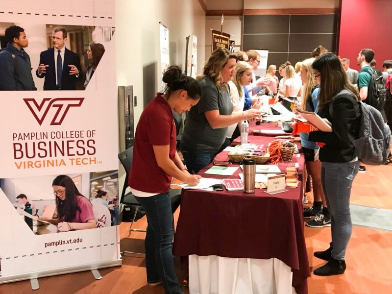 A student talks to an advisor at a table for the Pamplin College of Business during the majors and minors fair in Squires last year.