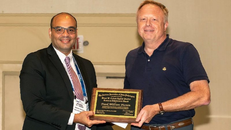 Bill Pierson, emeritus professor of Biosecurity and Infection Control and Clinical Specialist in Poultry Health with the Virginia-Maryland College of Veterinary Medicine receives his award