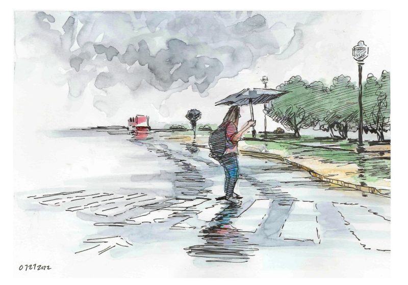Ink and watercolor sketch of student in crosswalk with umbrella. It's raining. 