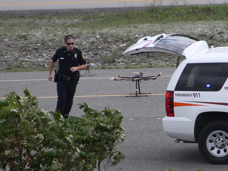An emergency responder uses a drone.