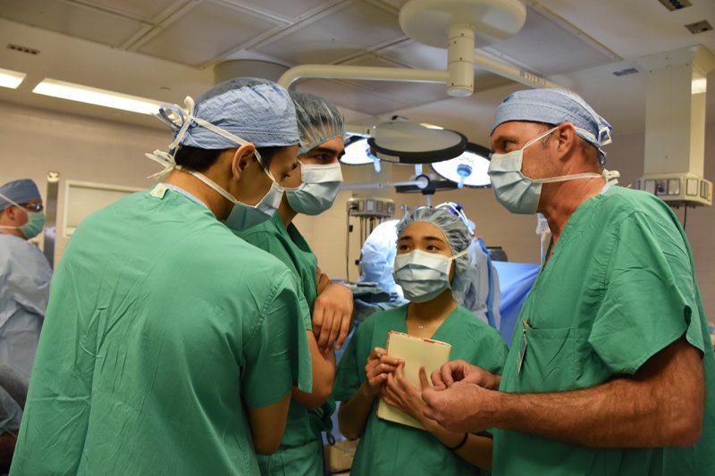 Harry Sontheimer talks to students in operating  room