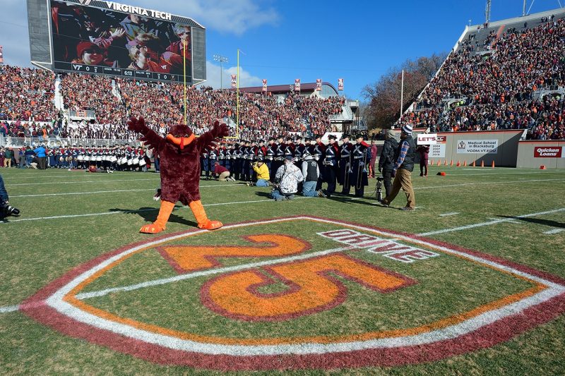 The HokieBird shows off the Drive for 25 logo at a football game last fall. 