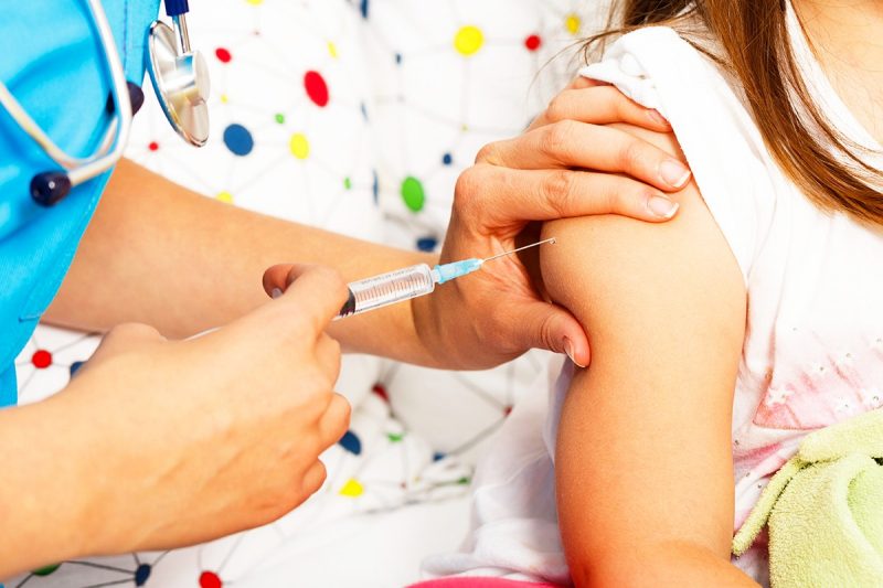 child receives flu vaccination