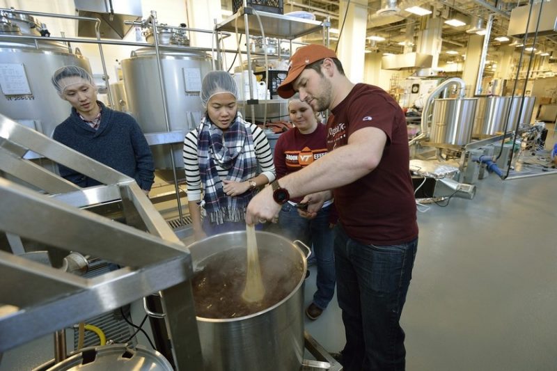 Students work in a brewhouse at Virginia Tech