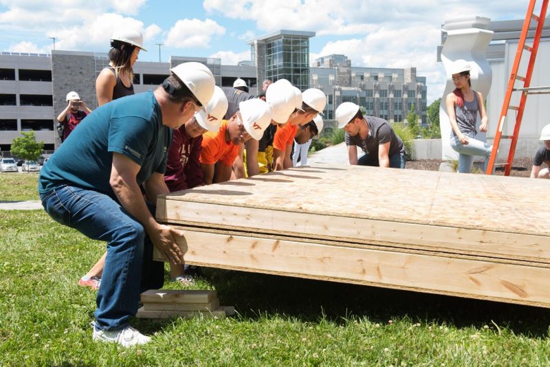 Students constructing a prototype disaster shelter