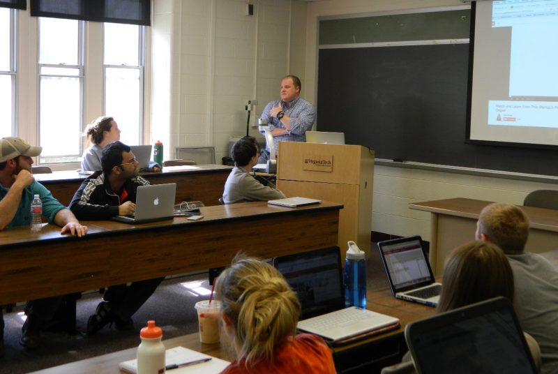 David Townsend is shown in class with entrepreneurship students.