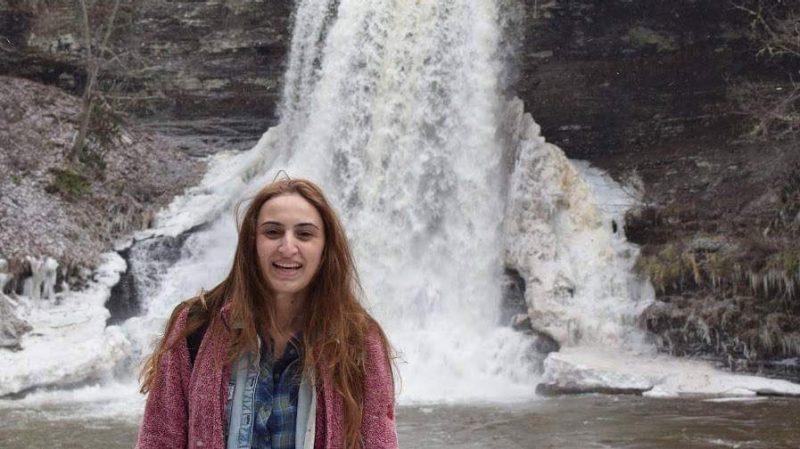 Teona Zurabashvili poses in front of the waterfall at the Cascades in Pembroke, Virginia. 