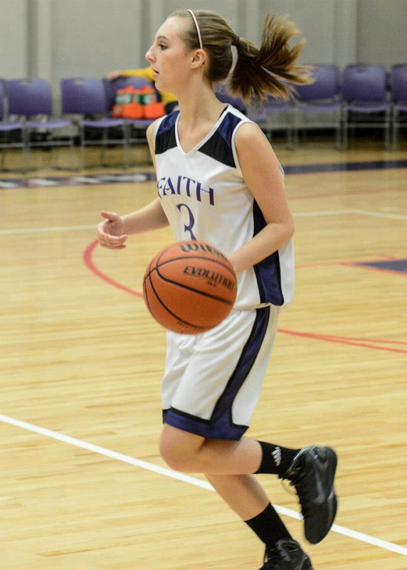 Allyson Bailey playing basketball.
