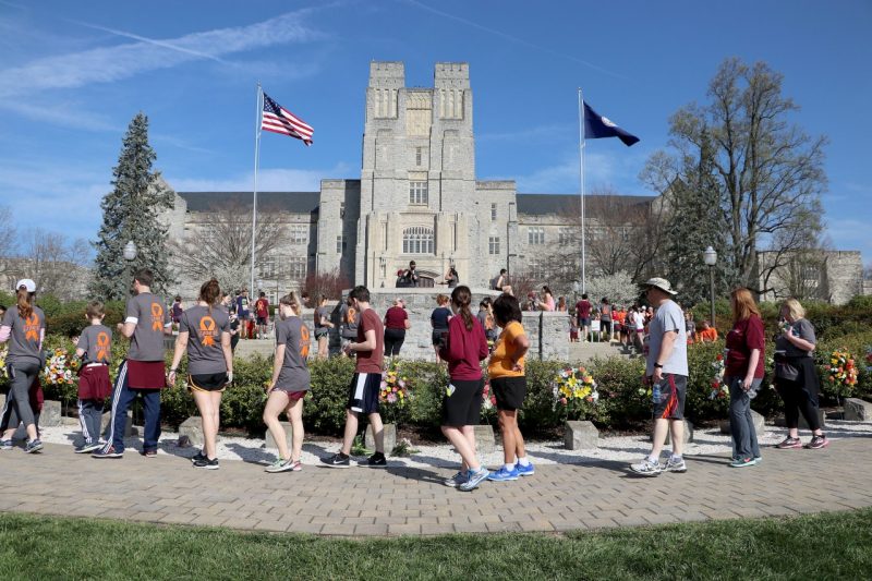 Participants in run visit April 16 Memorial