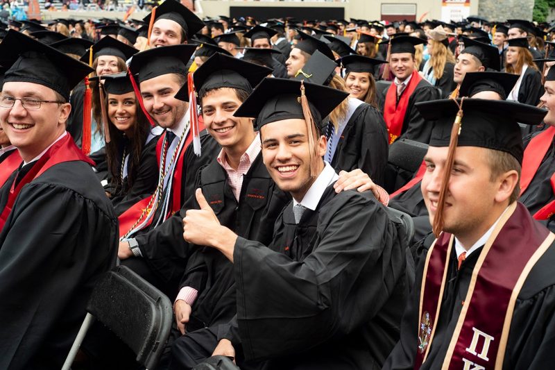 Graduates give a thumbs up