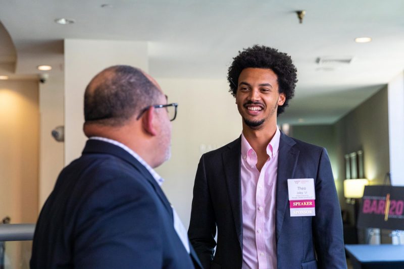 Theo Jolley '17 talks with an alumnus at the Black Alumni Summit in Arlington, Virginia.