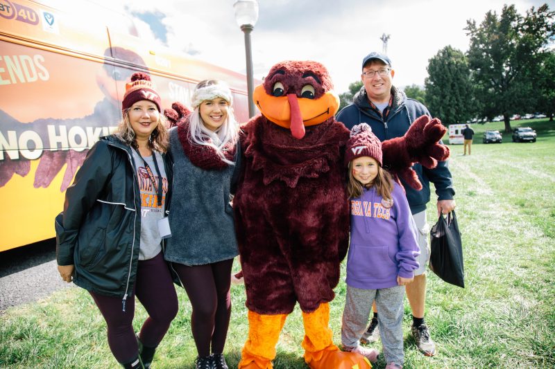 The Hokie Bird joins a family to celebrate Virginia Tech during Fall Family Weekend 2018. 