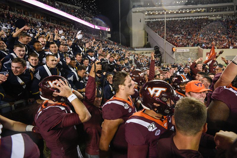 Hokies on the field after defeating UNC