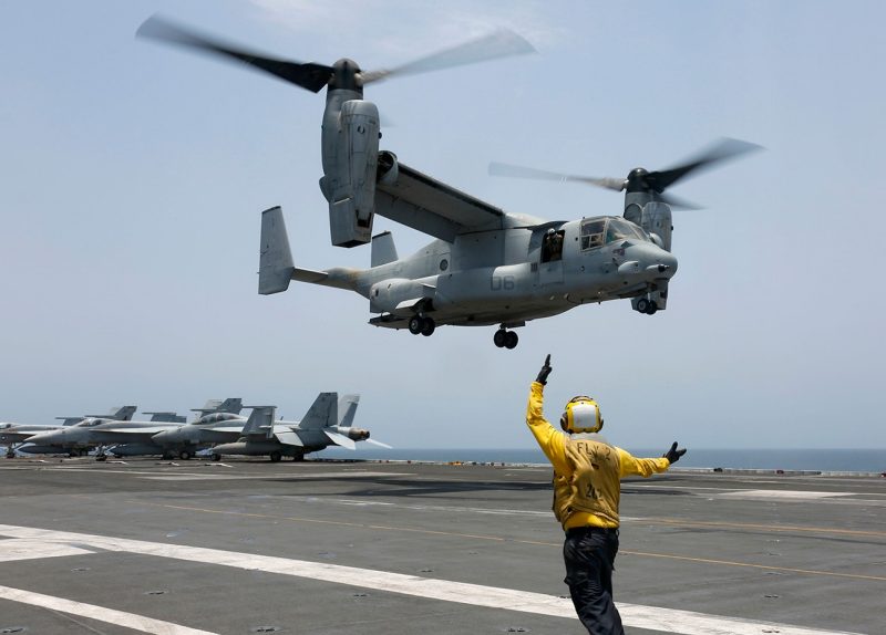 An MV-22 Osprey from Marine Medium Tiltrotor Squadron 264 lands on the flight deck of the USS Abraham Lincoln.