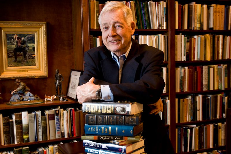 James I. “Bud” Robertson Jr., founding director of the Virginia Center for Civil War Studies, stands in his home study with some of his published works.