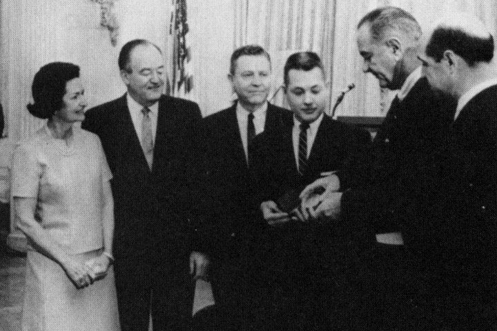 On February 12, 1965, James I. “Bud” Robertson Jr. (third from right), then executive director of the United States Civil War Centennial Commission, presented a Civil War Centennial Commission medallion to President Lyndon B. Johnson at ceremonies held in the White House. Lady Bird Johnson, the first lady, stands at the left of the photo, next to Vice President Hubert Humphrey.