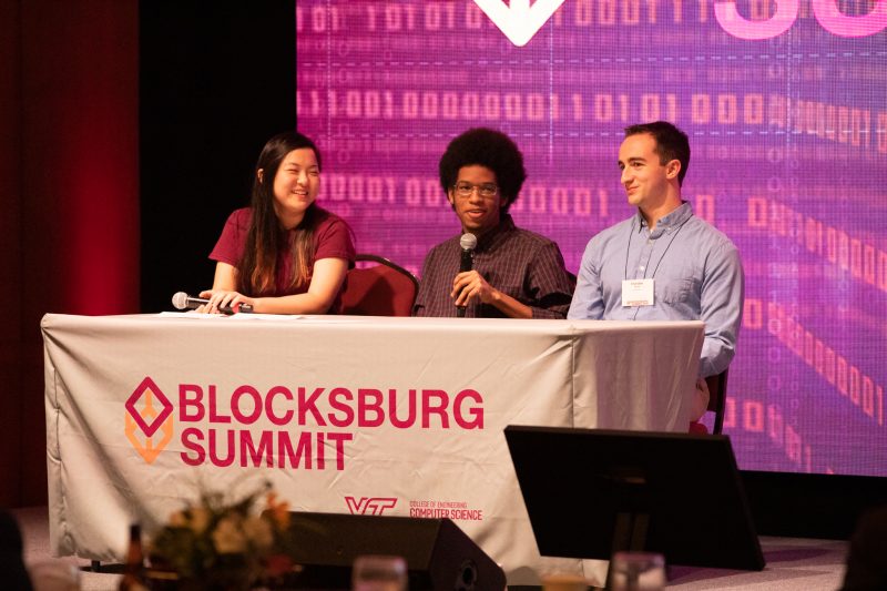 Virginia Tech Blockchain Challenge Finale students, from left, Jiayi "JW" Lee, Nicolas Hardy, and Chandler Jearls, share video demos of their winning blockchain-based projects. 