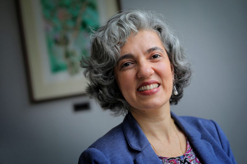 Portrait photo of Najla Mouchrek, smiling. 