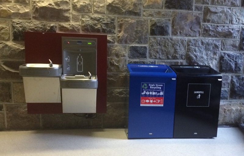 Recycling station and water bottle refill station are seen in McBryde Hall.