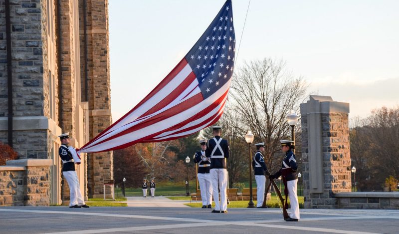 Cadets fold flag at War Memorial Pylons