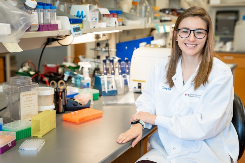 Rachel Padget sits in the laboratory of James Smyth, an assistant professor with the Fralin Biomedical Research Institute at VTC, where she is a doctoral candidate.