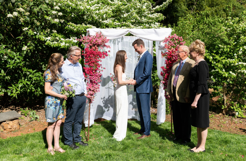 Lena and Mark have a backyard and Zoom wedding