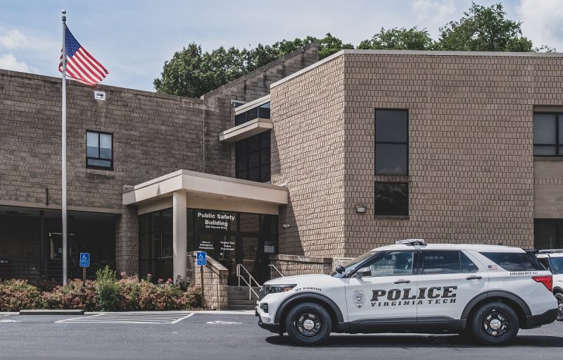 Virginia Tech Police Department SUV parked in front of Public Safety Building