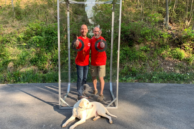 Bobby Vance (left) and his father, Tom, celebrate a successful prototype of the COVID Shield.  Photo courtesy of Bobby Vance.