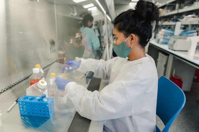 Picture of a female Student in the biomedical cellular engineering course getting hands-on experience during the fall 2020 semester