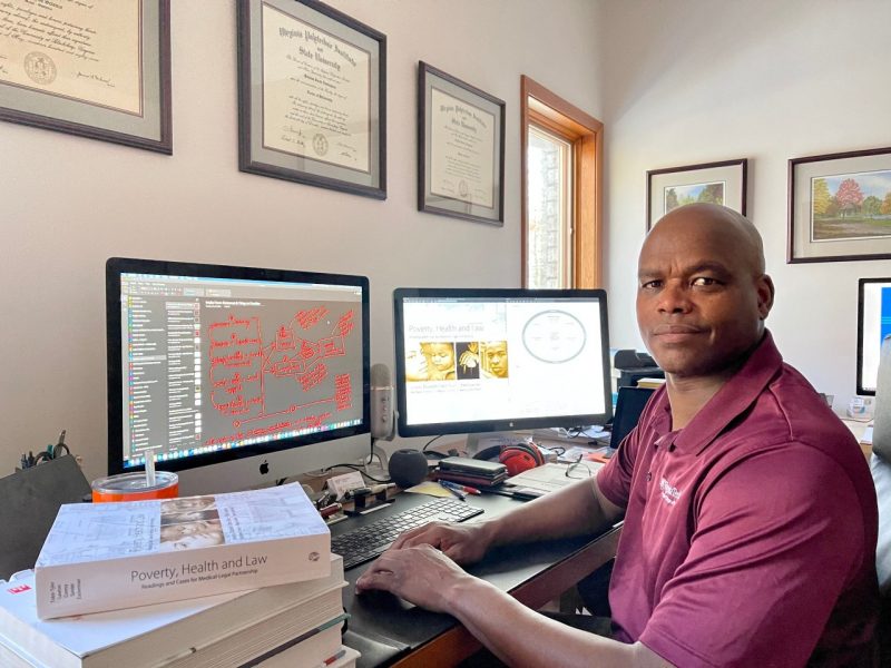 Pamplin faculty member Quinton Nottingham, shown in his office at home, will guide a team of Virginia Tech students in data collection and analysis for the program.