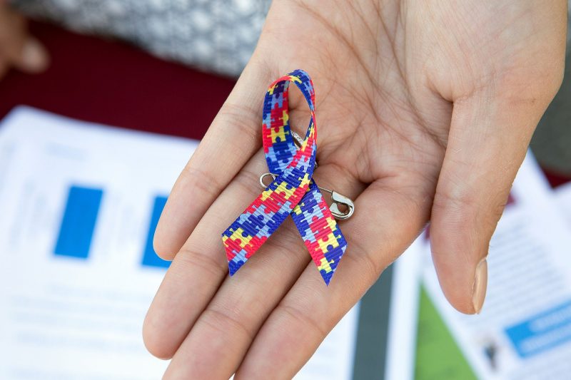 The Autism Awareness Ribbon is multi-colored ribbon with a puzzle pattern.