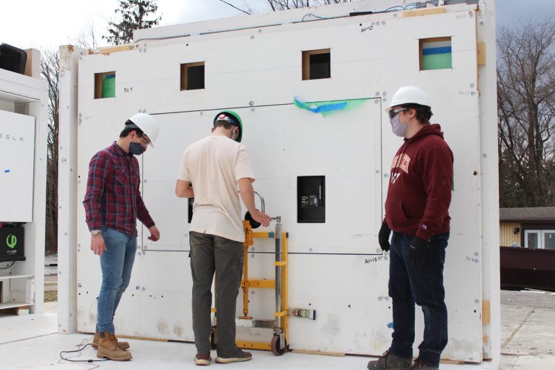 Students work on the framing of FutureHAUS