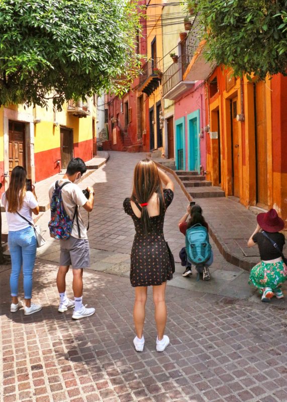 Students photograph buildings in Guanajuato, Mexico.