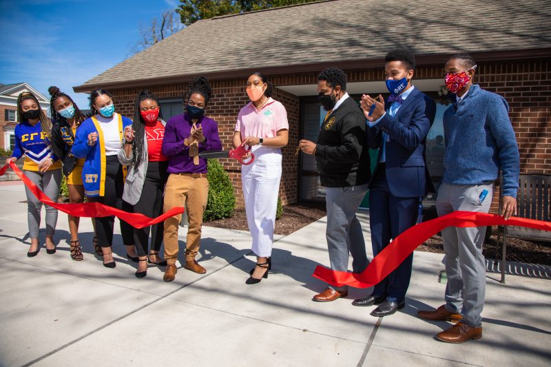 Nine members of the National Pan-Hellenic Council at the grand opening of the NPHC House. 