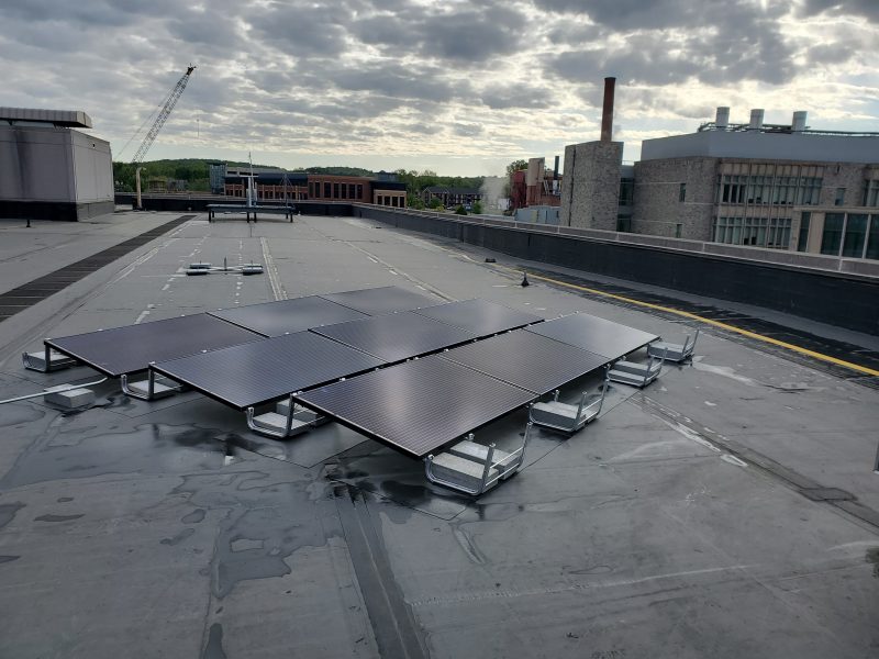 Nine solar panels on roof of Durham Hall.