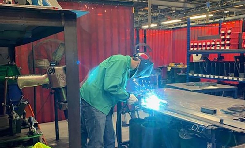 Spencer Macturk practices his welding during a co-op at Altec.