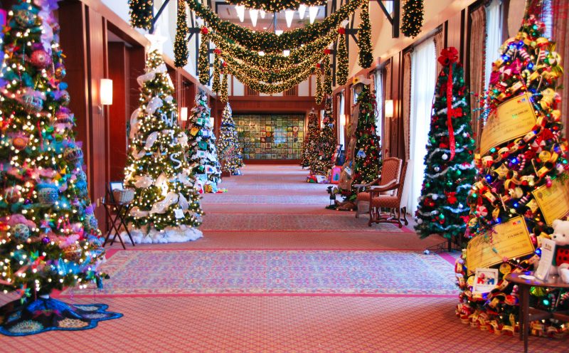 Decorated trees lining a foyer at the inn