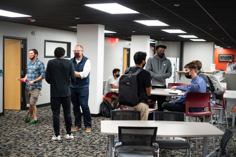 Students meet in the new home for the Apex Center for Entrepreneurship, which is above PK's Bar & Grill in Blacksburg.