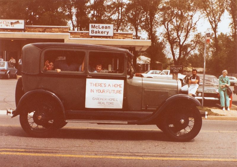 Together with business partners, Mitchell increasingly began to move into real estate throughout the 1970s. Here he is pictured with friends during a parade for local businesses in McLean, Virginia, in 1983. The vehicle, a 1929 Model A, still remains in Mitchell’s personal car collection. Photo courtesy of Norris Mitchell.