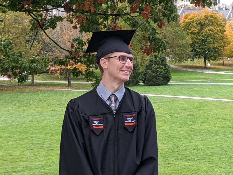 Dominic Pedrotty posed graduation (smiling)