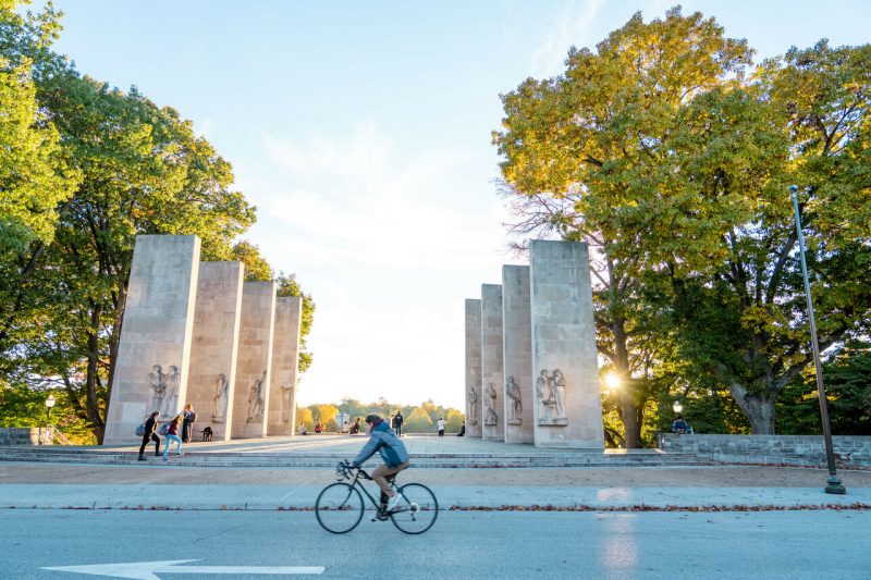 Cyclist in front of Pylons on a sunny fall day